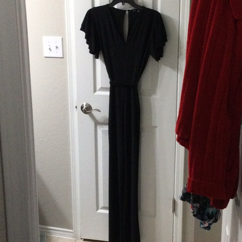 Black jumpsuit with ruffle sleeves